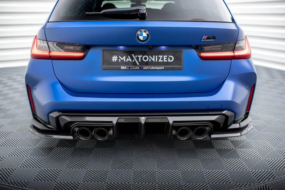 Maxton Design carbon rear diffuser and quad exhaust fitted to a blue BMW M3