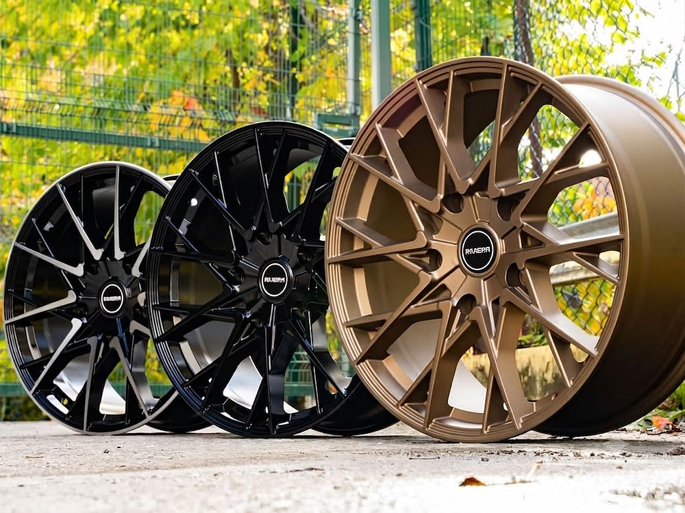Riviera alloy wheels in gloss black and bronze finishes, side by side